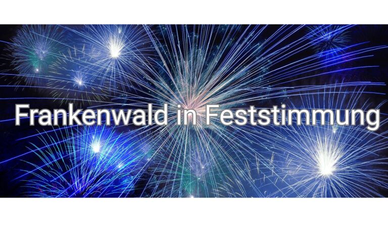 Fireworks display at night with bold white text reading 'Frankenwald in Feststimmung' across the center.
